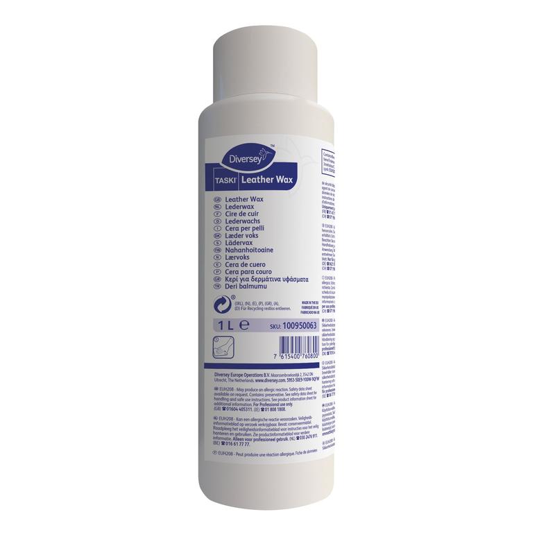 Eine weiße 1L Flasche TASKI Leather Wax von Diversey Deutschland GmbH & Co. OHG trägt auf der Vorderseite ein blaues und lila Etikett mit Produktinformationen und Hinweisen zur effektiven Lederpflege und zum natürlichen Glanz in mehreren Sprachen.
