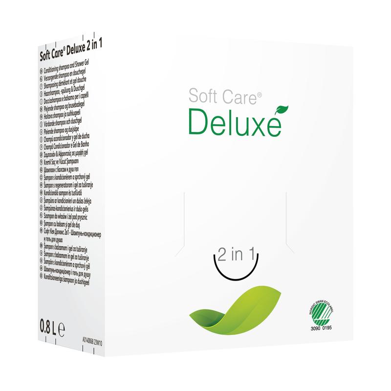 Eine weiße Schachtel mit der Aufschrift „Soft Care Deluxe 2 in 1, Duschgel & Shampoo“ von Diversey Deutschland ist mit einer grünen Blattgrafik, einer 0,8-Liter-Volumenanzeige, seitlichen Anweisungen und einem Umweltzeichen auf der Vorderseite versehen.