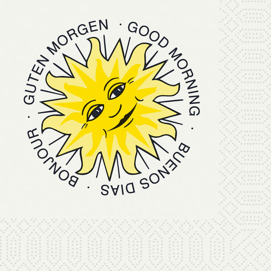 Die Duni GmbH Zelltuchservietten 24 x 24 cm 3-lagig zeigen eine lächelnde gelbe Sonne und "GOOD MORNING", "BUENOS DIAS", "BONJOUR", "GUTEN MORGEN" auf weißem Hintergrund. Jede Packung enthält 250 Servietten mit einem knackigen, fröhlichen Design.
