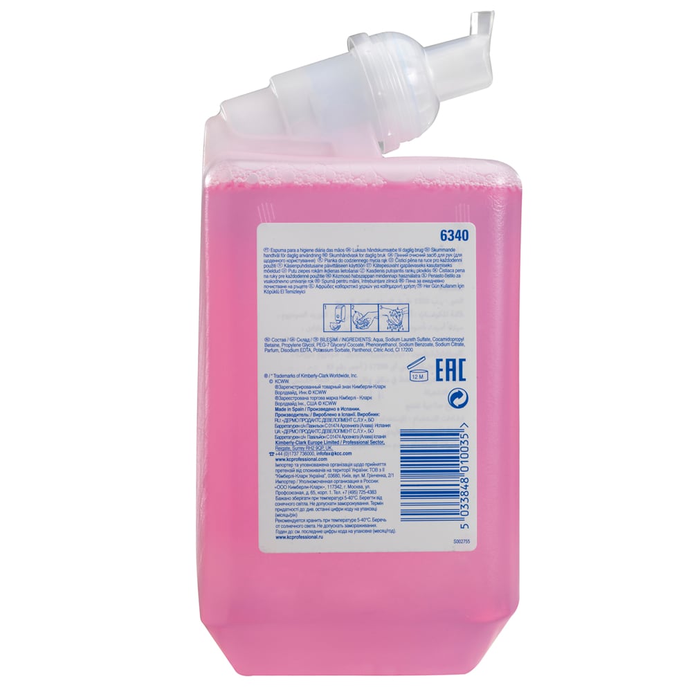 Eine rosafarbene 1L Scott® Essential™ Schaumseife Nachfüllkassette von Kimberly-Clark GmbH mit klarer Spenderkappe und beschrifteter Vorderseite - ideal für die tägliche Verwendung; kommt in einem Karton mit 6 Kartuschen.