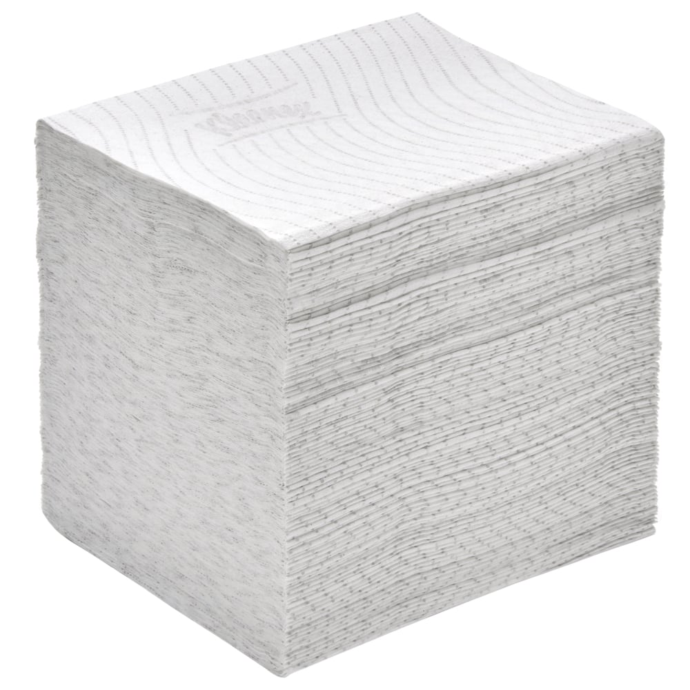 Ein großer Stapel weißes, quadratisches Kleenex® Toilettenpapier von Kimberly-Clark GmbH ist übersichtlich angeordnet, ideal für den Einsatz im Einzelblattsystem. Jeder Karton enthält 36 Packungen mit 200 hochwertigen Blättern - perfekt als Premium-Toilettenpapier.