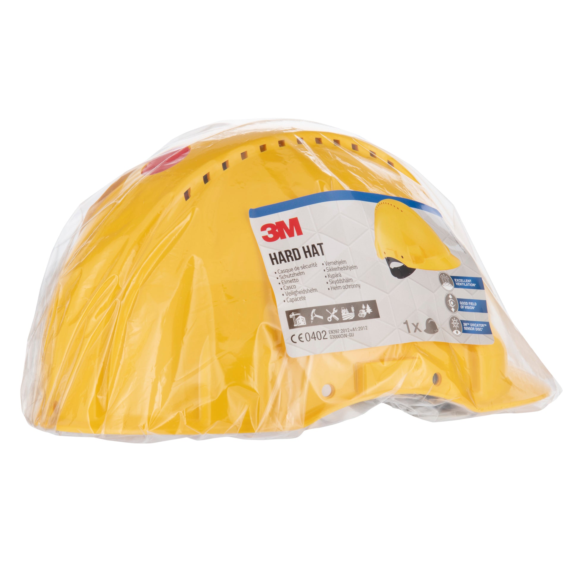 Der gelbe 3M™ Schutzhelm G3000C Uvicator von 3M Deutschland GmbH wird in einer durchsichtigen Kunststoffverpackung mit einem Produktinformationsetikett, Arbeitsschutzsymbolen, einem Uvicator-Sensor und einer kleinen Abbildung des Schutzhelms geliefert.