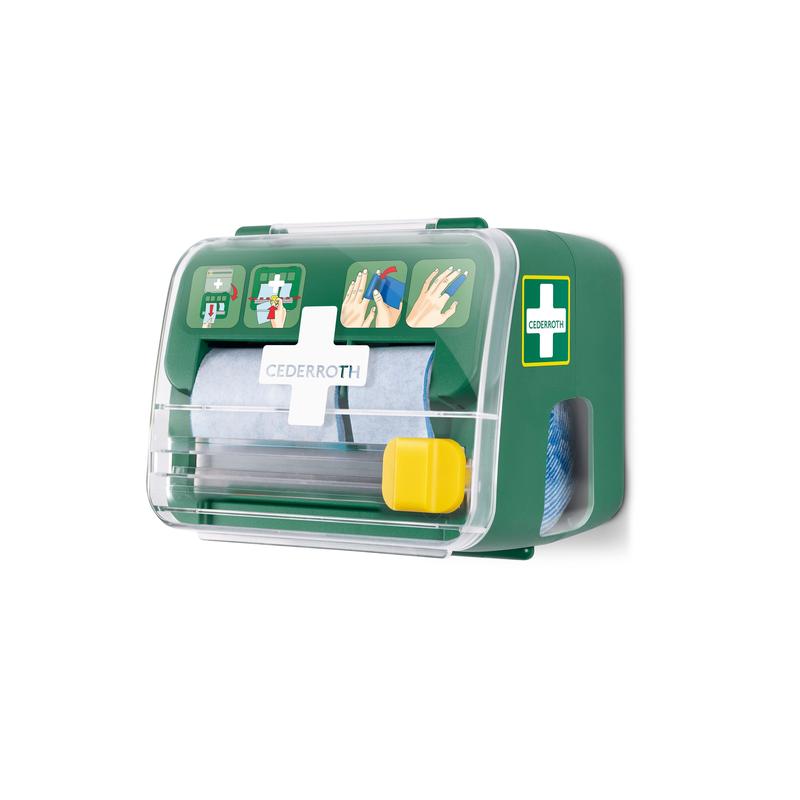 Ein grüner, transparenter Cederroth weichschaumbinde 2-in-1 Spender von Orkla Wound Care AB ist an einer weißen Wand montiert, hält eingepacktes Material und zeigt auf der Vorderseite eine illustrierte Erste Hilfe Anleitung.