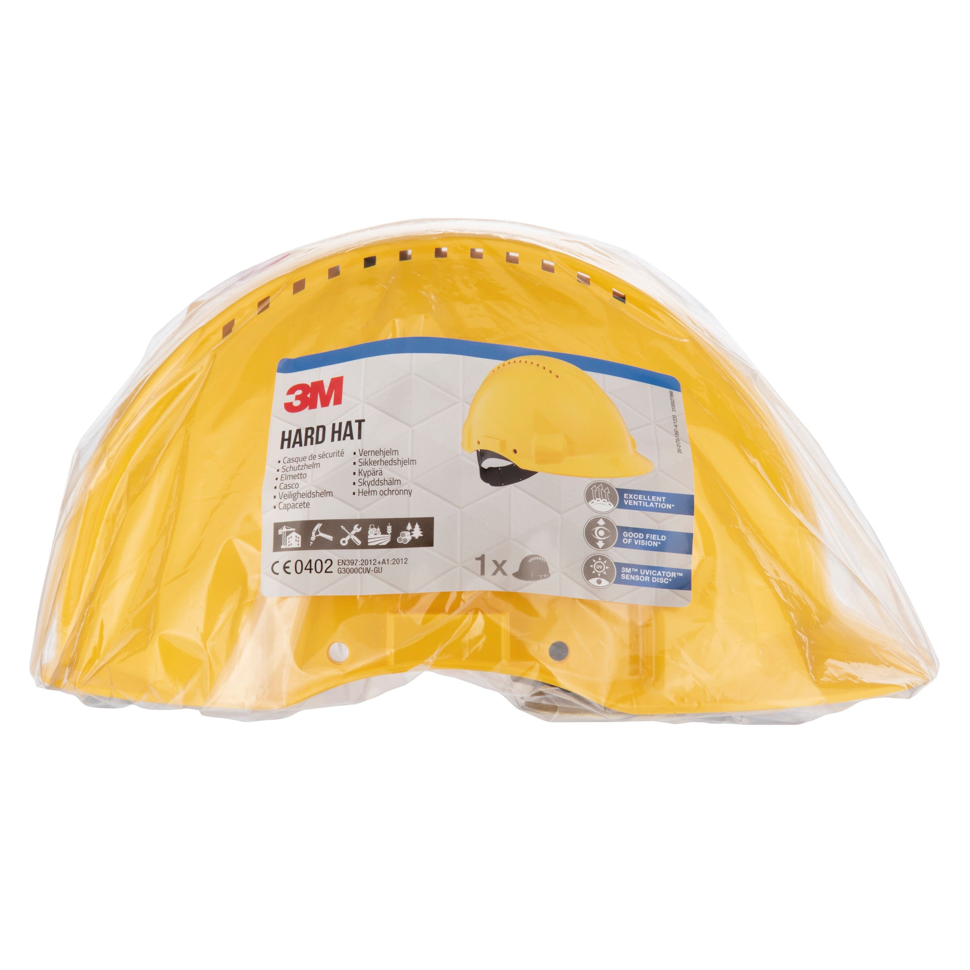 Ein gelber 3M™ Schutzhelm G3000C Uvicator (3M Deutschland GmbH), versiegelt in durchsichtigem Kunststoff mit einem Etikett mit Sicherheitszertifizierungen, Angaben zum Uvicator-Sensor, Hauptfunktionen und einem Foto des Schutzhelms auf der Vorderseite.