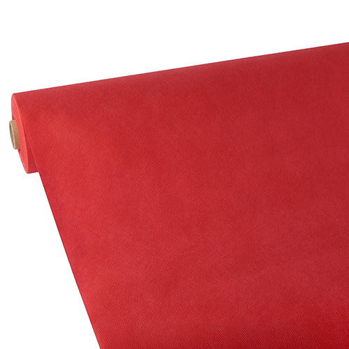 Eine teilweise abgerollte Rolle Starpak Tischdecke, stoffähnlich, Vlies „Soft Selection“ von Starpak auf weißem Hintergrund hebt die Textur und Dicke des Stoffes hervor.
