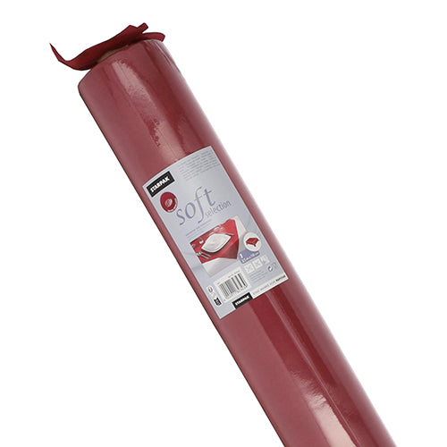 Eine Rolle roter Starpak Tischdecke, stoffähnlich Vlies „Soft Selection“, ist in transparenter Folie eingewickelt. Das Etikett zeigt einen gedeckten Tisch, Produktinformationen und einen Barcode. Marke: Starpak.