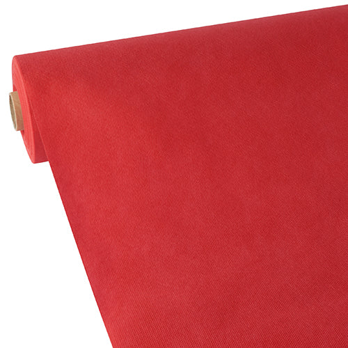 Eine große Rolle Starpak-Tischdecke, stoffähnliches Vlies „Soft Selection“, ist teilweise auf einer weißen Oberfläche ausgerollt und zeigt ihre glatte Textur, gleichmäßige Farbe und ansprechende Dicke, die für die Marke Starpak charakteristisch ist.