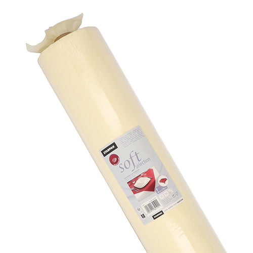 Eine große Rolle hellgelbes Backpapier „Soft Selection“ von Starpak Tischdecke, stoffähnlich Vlies, mit einem Etikett mit der Marke, Produktinformationen und Bildern von Backwaren für Ergebnisse, die so glatt sind wie mit der Soft Selection von Starpak.