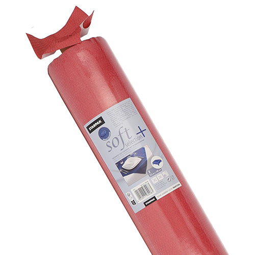 Eine rote Rolle "Starpak Tischdecke, stoffähnlich, Vlies soft selection plus" in Kunststoffverpackung zeigt Produktdetails und Verwendung unter einem Teppich; ideal als strapazierfähige Tischdecke oder Stabilisierungsschicht für die stoffähnliche Tischdecke von Starpak.