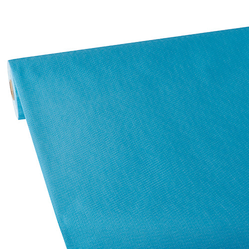 Eine Rolle Starpak Tischdecke, stoffähnlich, Vlies "soft selection plus" von Starpak ist teilweise ausgerollt auf einem weißen Hintergrund abgebildet. Der glatte, leicht strukturierte Stoff ist perfekt für einen stilvoll und praktisch gedeckten Tisch.