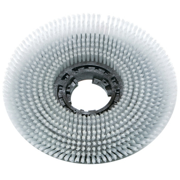 Eine runde, graue Scheuerbürste Waschbeton (Ø 43 cm) von Diversey Deutschland GmbH & Co. OHG mit dichten, abgeschrägten Borsten und zentraler schwarzer Kunststofffassung. Die Draufsicht zeigt das runde Borstenmuster. Packung: 1 Stück.