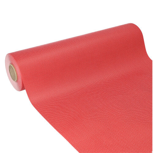 Der Starpak Tischläufer, stoffähnlich, Vlies „soft selection plus“ (24 m x 40 cm) ist teilweise ausgerollt abgebildet, der Kartonkern ist sichtbar. Seine leicht strukturierte rote Oberfläche eignet sich ideal als Tischläufer für besondere Anlässe.