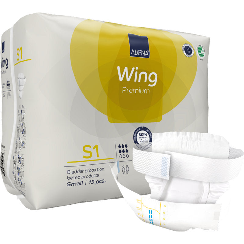 Eine Packung der Abena Re-Seller GmbH ABENA Wing Premium mit einer aufgefalteten weißen Erwachsenenwindel auf der Vorderseite; die Verpackung zeigt 15 kleinformatige Exemplare, die zuverlässigen Schutz und Komfort für die Anwender bieten.