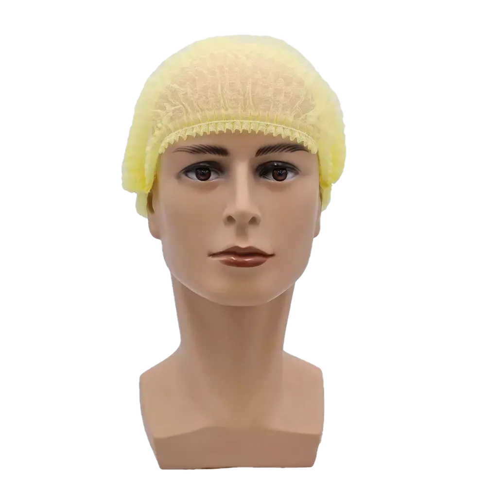 Ein Puppenkopf präsentiert eine gelbe AMPri MED-COMFORT Klipphaube 52 cm, hergestellt aus Polypropylen von der AMPri Handelsgesellschaft mbH, mit einem neutralen Ausdruck vor einem schlichten weißen Hintergrund, wodurch der hygienische Schutz betont wird.