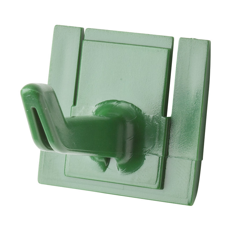 Der Haug Bürsten KG ERSATZ-STIELHALTERUNG HAKEN 42x32x31mm, für Art.8699, ist ein grüner Kunststoff-Wandhaken mit rechteckiger Grundfläche und einem einzelnen abgewinkelten Haken, ideal zum Aufhängen von Werkzeugen oder kleinen Gegenständen.