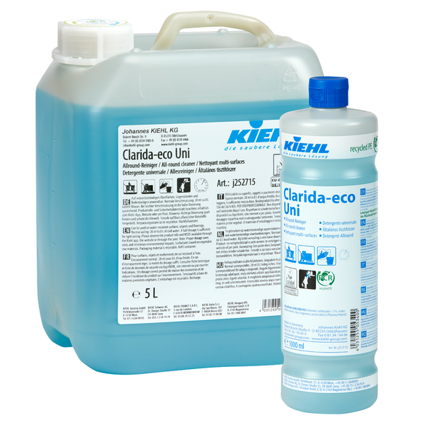 Zwei Kunststoffbehälter von Johannes Kiehl KG Kiehl Clarida-eco Uni Allround-Reiniger: ein 5-Liter-Kanister und eine 1-Liter-Flasche, beide mit blauer Flüssigkeit - ein wirksamer Reiniger für alle Oberflächen, mit mehrsprachiger Beschriftung.