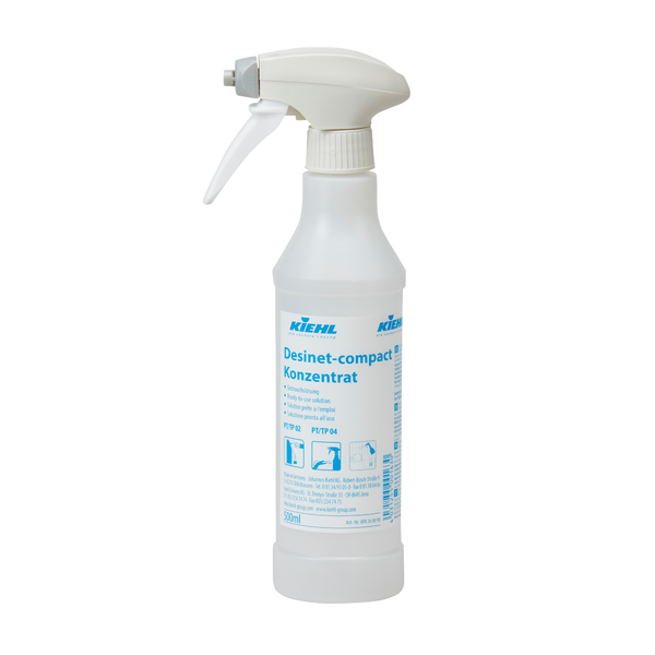 Abgebildet ist eine weiße 500 ml Trichterflasche mit der Aufschrift "Kiehl Desinet compact" der Johannes Kiehl KG, leer und mit 6 Schaumsprühern versehen, vor einem schlichten weißen Hintergrund. Die Packung enthält 6 Flaschen.