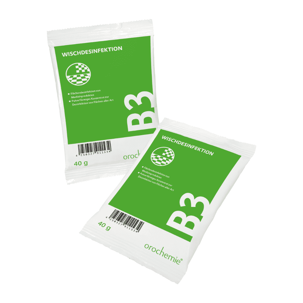 Abgebildet sind zwei weiße Päckchen mit der Aufschrift "Orochemie B 3 Wischdesinfektion" (je 40 g) der orochemie GmbH + Co KG mit grünem Hintergrund, Produktdetails, Barcode und Branding zur effektiven Flächendesinfektion. Packung: 60 Beutel à 40 g.