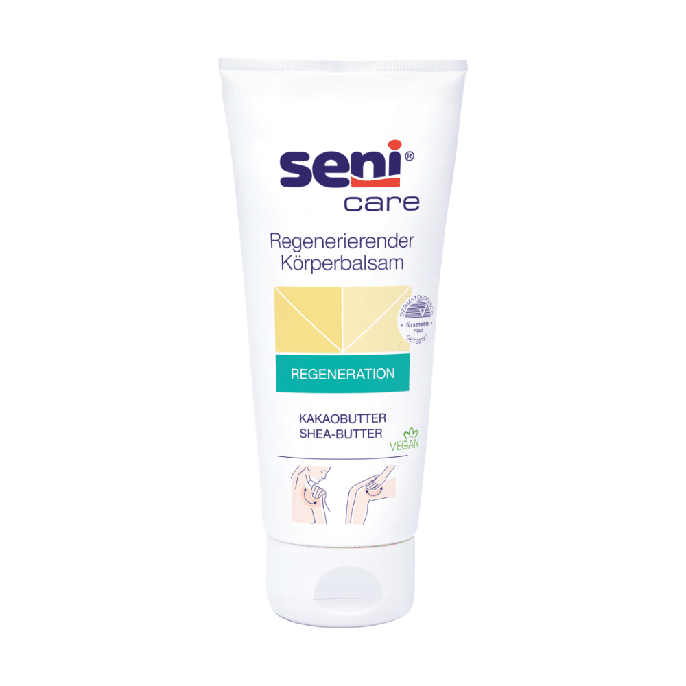 Eine weiße Tube Seni Care Pflegebalsam für trockene Haut (200 ml) von TZMO Deutschland GmbH mit Kakao- und Sheabutter, grünes „vegan“-Etikett, bebilderte Gebrauchsanweisung unten – spendet intensive Feuchtigkeit für trockene Haut.