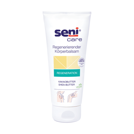 Eine weiße Tube Seni Care Pflegebalsam für trockene Haut (200 ml) von TZMO Deutschland GmbH mit Kakao- und Sheabutter, grünes „vegan“-Etikett, bebilderte Gebrauchsanweisung unten – spendet intensive Feuchtigkeit für trockene Haut.