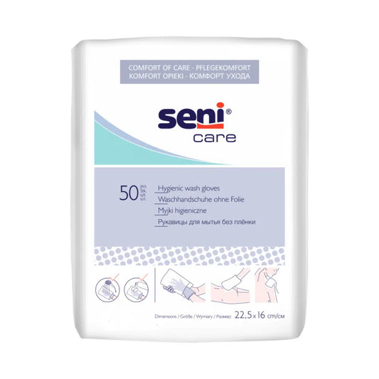 Eine weiße Packung Auslaufartikel: Seni Care Waschhandschuhe ohne Folie von TZMO Deutschland GmbH, enthält 50 Einweg-Waschhandschuhe (22,5 x 16 cm). Das mehrsprachige Etikett enthält Abbildungen zur Verwendung von Handschuhen. ideales Pflegeprodukt.