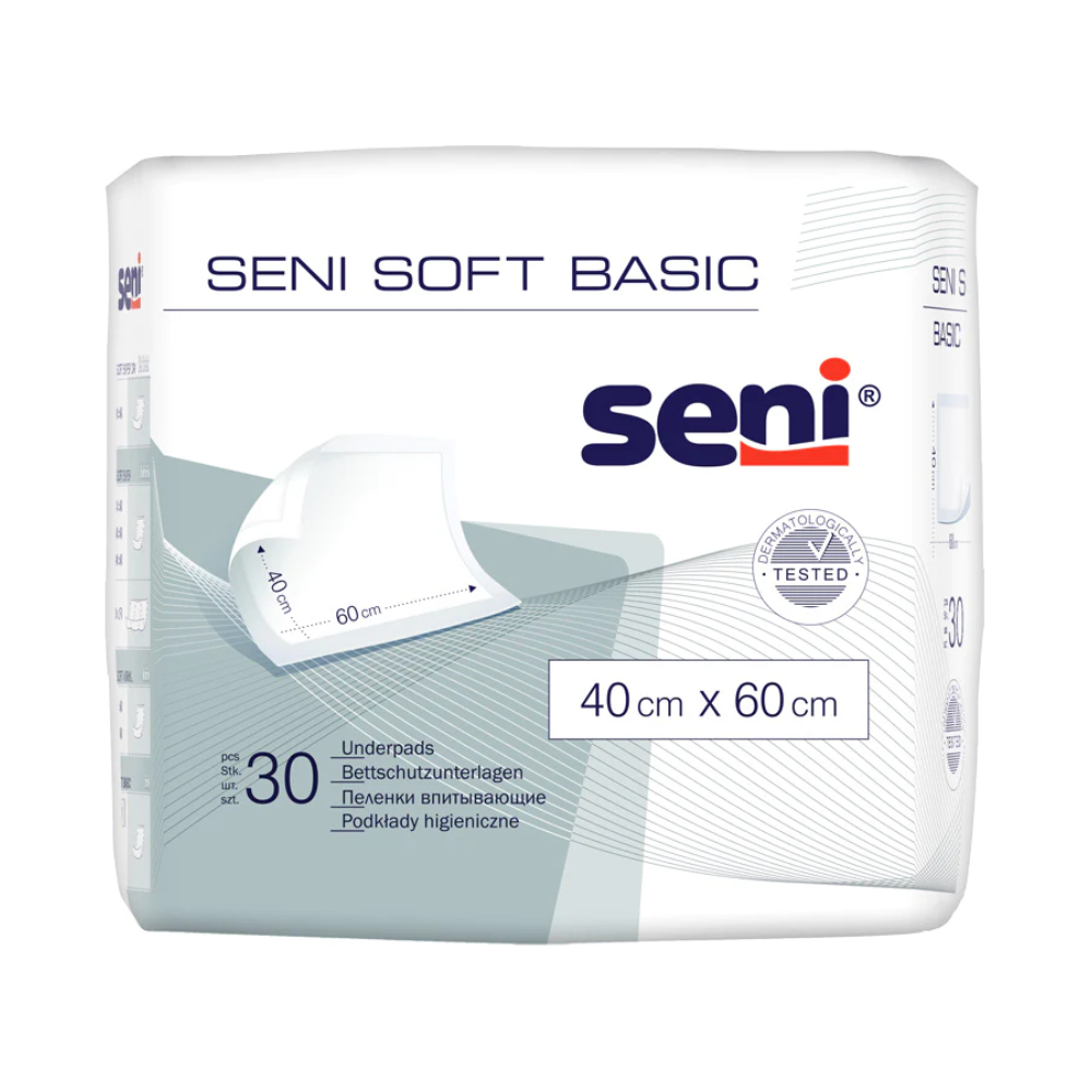 Eine 30er-Packung der Seni Soft Basic Bettschutzunterlage (verschiedene Größen) der TZMO Deutschland GmbH im weißen Beutel mit blaugrauen Akzenten bietet zuverlässigen Schutz. Das Seni-Logo und die Produktinformationen sind deutlich sichtbar.