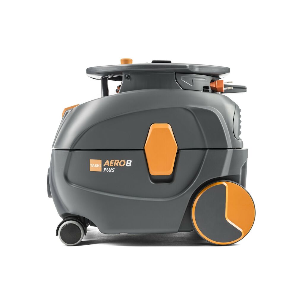 Seitenansicht des eleganten, grau-orangefarbenen TASKI AERO 8 PLUS von Diversey Deutschland GmbH & Co. OHG, der seine großen Räder und sein modernes, kompaktes Design mit Flüstertechnologie für leisen Betrieb zeigt. Dieser leistungsstarke und effiziente leise Kesselsauger wurde fachmännisch für Ihre Reinigungsanforderungen gefertigt.