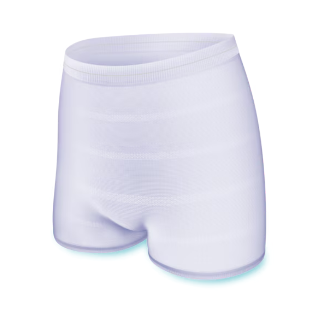 Das Bild zeigt eine weiße, nahtlose TENA Fix Inkontinenz-Fixierhose von TENA – Essity Germany GmbH mit anliegendem Bund. Der glatte und leicht reflektierende Stoff suggeriert, dass er dehnbar und bequem ist, was ihn ideal für Inkontinenz-Fixierhosen macht. Die Hose besticht durch ein klares und minimalistisches Design.