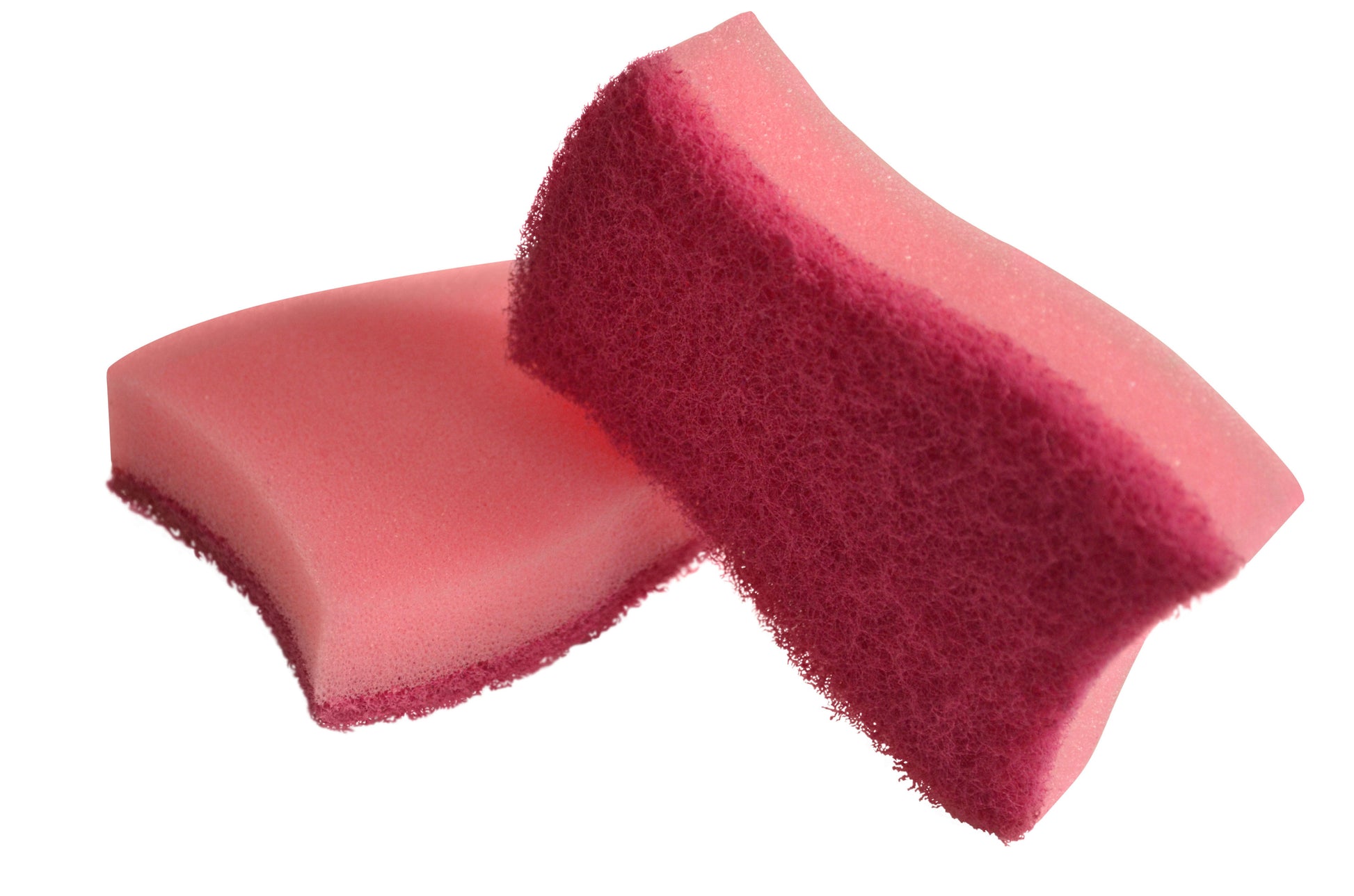 Abgebildet sind zwei Scotch-Brite® Delicate Color kratzfreie Reinigungsschwämme von 3M Deutschland GmbH, rosa mit dunkelroter Schleiffläche, gestapelt auf weißem Hintergrund, wobei einer leicht an den anderen angelehnt ist. Die Packung enthält 2 Stück.