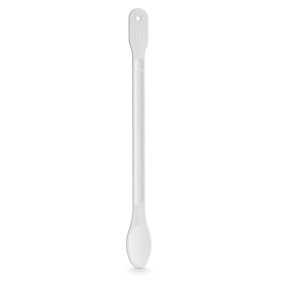 Der Dr. Schumacher Rührlöffel (1 Stück) der Dr. Schumacher GmbH ist ein langes, schlankes, weißes Küchenutensil aus Kunststoff mit einem kleinen Loch in der Nähe des oberen Endes und einer abgerundeten Löffelschale, abgebildet auf einem schlichten weißen Hintergrund.