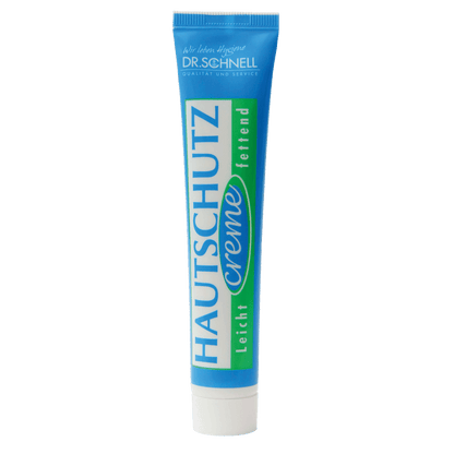 A tube from DR.SCHNELL GmbH & Co. KGaA DR.SCHNELL'S SKIN PROTECTION CREAM (50 x 50 ml) in the colors blue, green, and white is labeled in German, identifying it as a light protective cream for the skin.