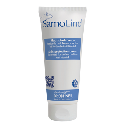 Eine weiße Tube Dr. Schnell SAMOLIND Hautschutz der DR.SCHNELL GmbH & Co. KGaA mit blauen Akzenten und deutsch/englischem Text. Die Creme schützt beanspruchte Haut bei Nässe und enthält Vitamin E.
