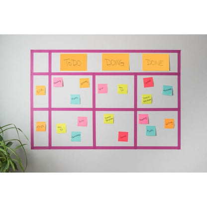 A wall-mounted Kanban board displays colorful 3M Deutschland GmbH Post-it® Super Sticky Notes (76x127mm, 90 sheets, 100% PEFC), labeled with tasks and names in the columns "To Do", "In Progress", and "Done". A green plant appears in the lower left corner.