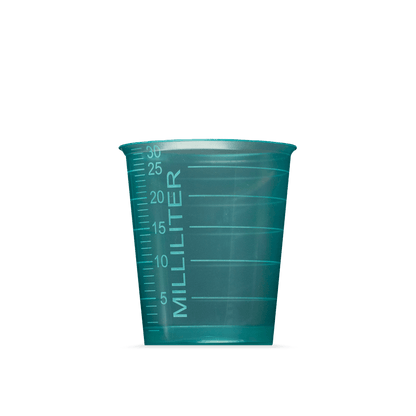 A translucent green MED COMFORT BASIC disposable medical cup by AMPri Handelsgesellschaft mbH, 30 ml, with milliliter graduations, stands on a plain white background - perfect for medical use.