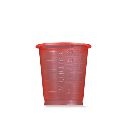 A translucent red MED COMFORT BASIC disposable medical cup, 30 ml, graduated by AMPri Handelsgesellschaft mbH for medical use, with a 30 ml marking, shown against a plain white background.