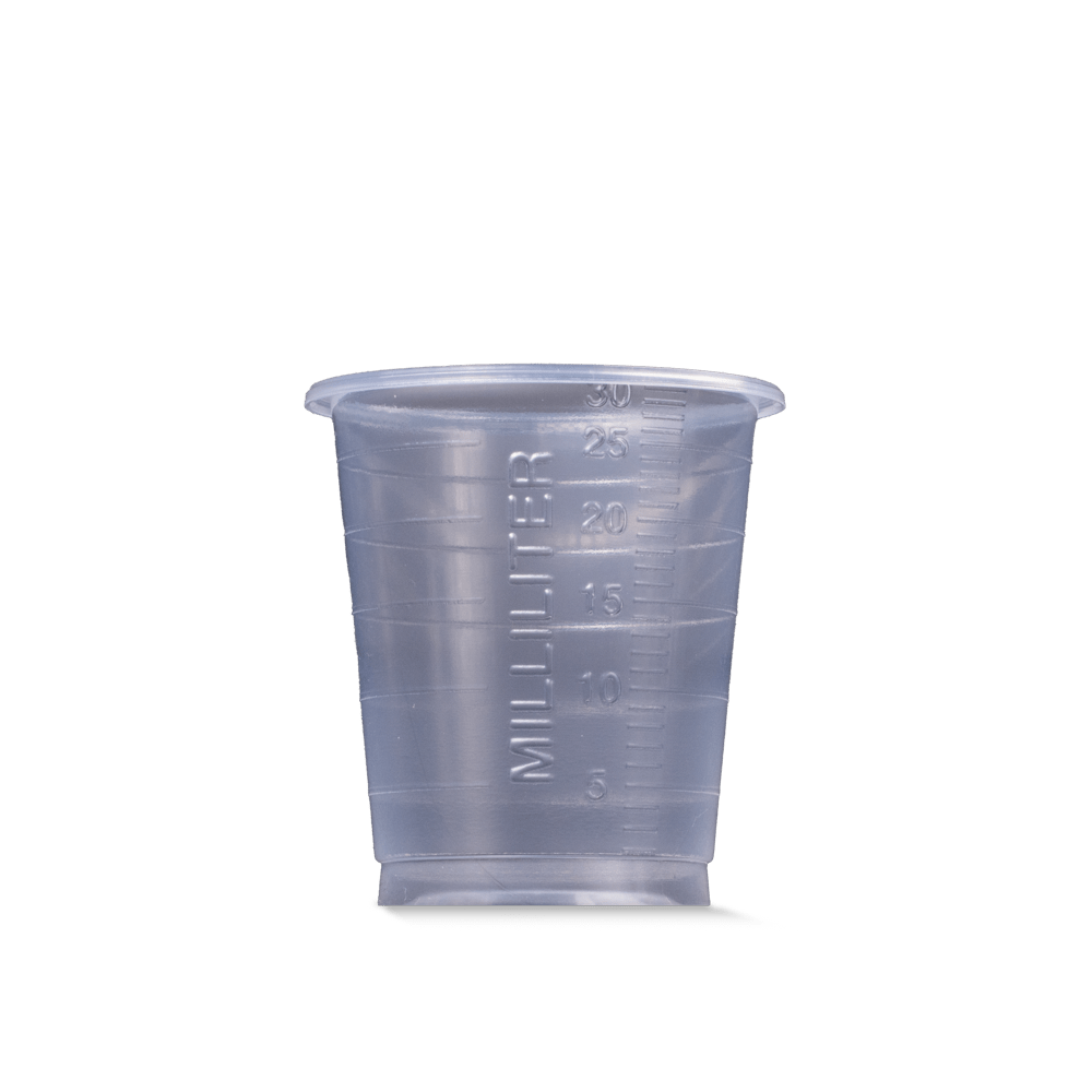 The MED COMFORT BASIC disposable medical cup by AMPri Handelsgesellschaft mbH is a clear 30 ml measuring cup, depicted upright and empty on a white background with a clearly visible milliliter marking - ideal for medical use.