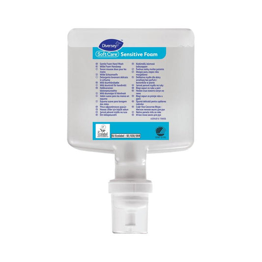 Die Soft Care Sensitive Foam, parfümfreie Schaumseife für empfindliche Haut (Kartusche 1300 ml) von Diversey Deutschland GmbH & Co. OHG ist ein rechteckiger Spender mit Bodenpumpe und mehrsprachiger Anleitung auf der Vorderseite.