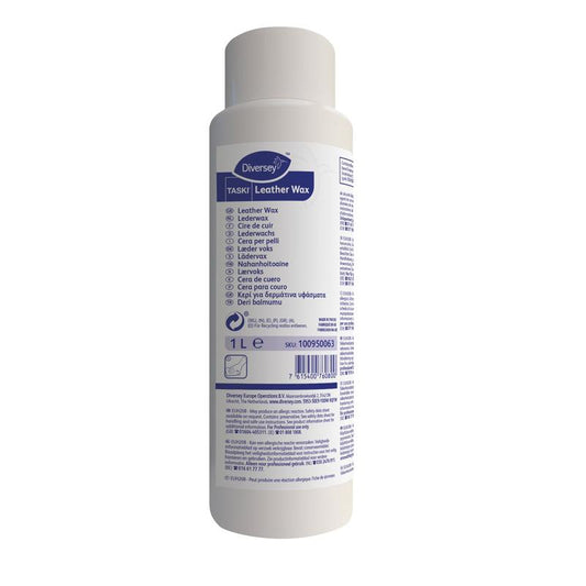Eine weiße 1L Flasche TASKI Leather Wax von Diversey Deutschland GmbH & Co. OHG trägt auf der Vorderseite ein blaues und lila Etikett mit Produktinformationen und Hinweisen zur effektiven Lederpflege und zum natürlichen Glanz in mehreren Sprachen.