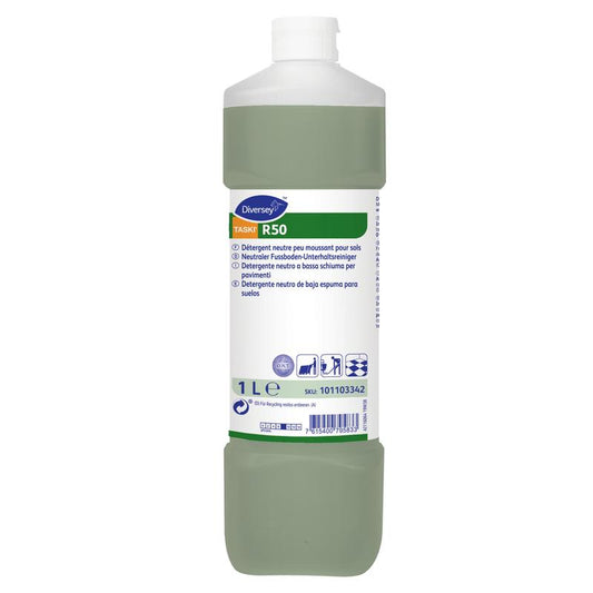 Eine 1-Liter-Flasche Diversey TASKI R50 Fußbodenunterhaltsreiniger von Diversey Deutschland GmbH & Co. OHG verfügt über ein weißes Etikett, grüne Flüssigkeit und Symbole zur Verwendung und empfohlenen Oberflächen für eine effektive Bodenpflege.