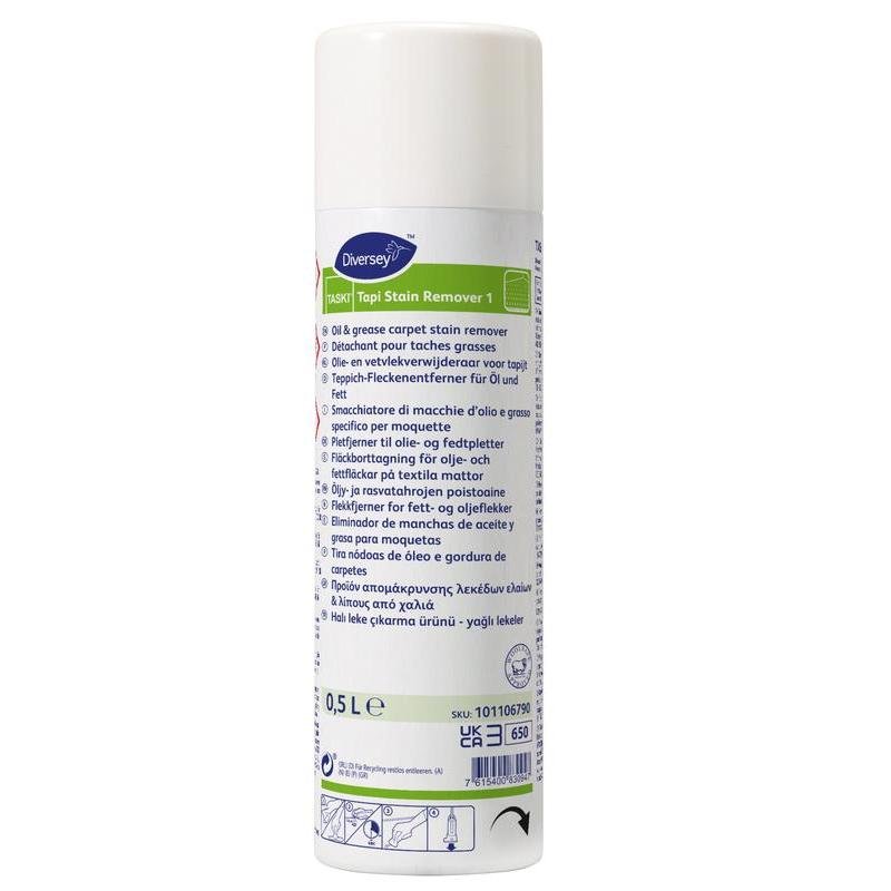 A 500 ml white aerosol can TASKI Tapi Stain Remover 1 from Diversey Deutschland GmbH & Co. OHG, a highly effective stain remover for solvent-soluble stains, with a multilingual label and a white cap.