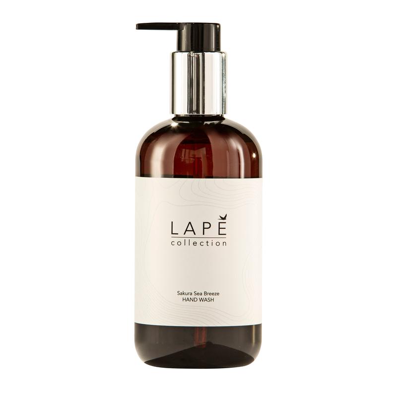 A brown plastic pump bottle from Diversey Deutschland GmbH & Co. OHG, labeled "LAPE Earth Collection Sakura Sea Breeze Hand Wash"-an eco-certified hand wash lotion with a delicate cherry blossom and sea breeze scent, 300 ml.