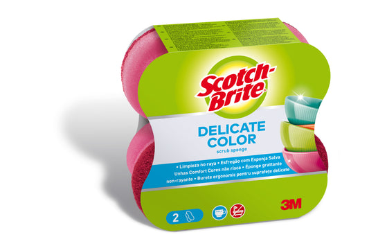 Eine Packung 3M Deutschland GmbH Scotch-Brite® Delicate Color Comfort kratzfreie Reinigungsschwämme, 2 Stück pro Packung, ist in einer grün-weißen Verpackung mit zwei rosa Schwämmen und bunten Schalen auf dem Etikett abgebildet.