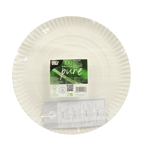 A stack of round, white PAPSTAR "pure" cardboard plates (100 pieces, FSC-certified) with a green-white banderole and clear plastic pouch with folded paper - sustainable from PAPSTAR GmbH.