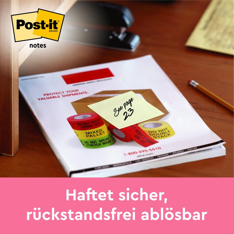 A yellow 3M Post-it® note (38 mm x 51 mm, Yellow) with the inscription "See page 23" is attached to papers on a desk. The Post-it logo is visible in the top left corner, and below is German information about sticky notes, 100 sheets/block.