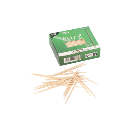 Eine grüne PAPSTAR-Box mit der Aufschrift „pure“ fasst 300 runde Zahnstocher aus Holz (6,5 cm). Vor der Box sind mehrere PAPSTAR-Zahnstocher auf weißem Untergrund angeordnet.