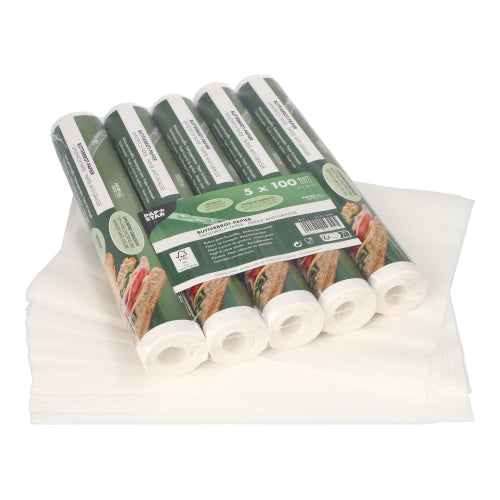 Fünf Packungen PAPSTAR 500 Blatt Butterbrotpapier (25x30cm, weiß) der PAPSTAR GmbH sind auf ungefalteten Blättern gestapelt und ordentlich auf einer weißen Fläche angeordnet.