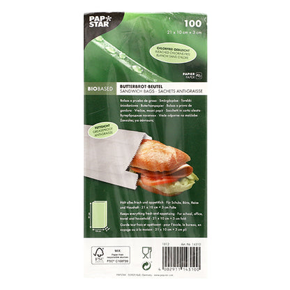 Eine 100er-Packung PAPSTAR Butterbrotbeutel fettdicht (21x10x3 cm, weiß) der PAPSTAR GmbH kommt in einer eingeschweißten Verpackung mit aufgedruckten Produktdetails und zeigt ein Sandwich im Inneren der fettdichten weißen Beutel.