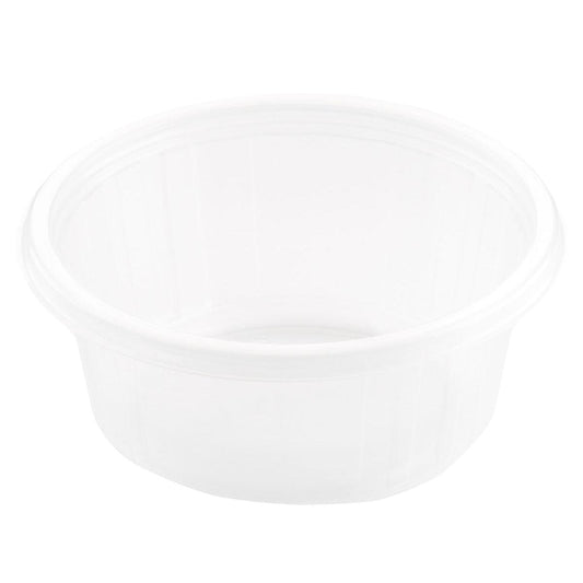 Der Fixpack® rund Transparent PP-Behälter der Duni GmbH ist ein klarer, runder Leerbehälter mit leicht erhöhtem Rand, dargestellt in der schrägen Draufsicht auf einen einfarbig weißen Hintergrund.