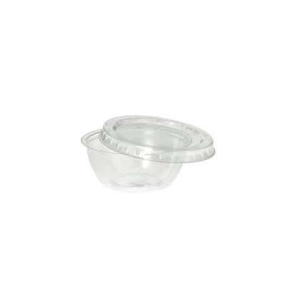 A clear, round 50ml Starpak PS dressing bowl with a transparent lid (Ø 6.7cm, height 2.7cm) is depicted empty against a white background – ideal for catering, available in packs of 100 pieces.