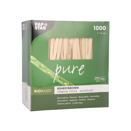 Eine grün-weiße PAPSTAR „pure“-Box enthält 1000 splitterfreie, 14 cm lange Rührstäbchen aus biobasiertem Birkenholz der PAPSTAR GmbH. Der Markenname erscheint oben links auf der Verpackung.